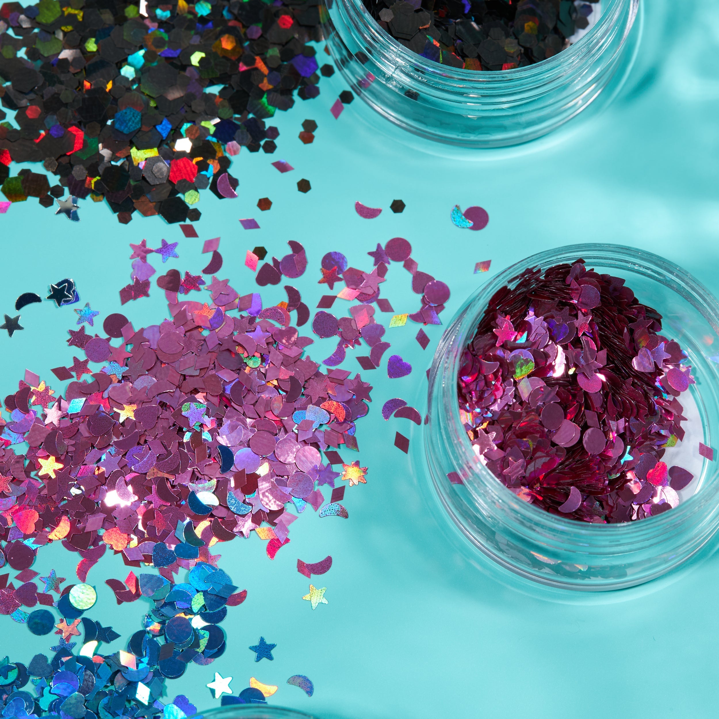 Holographic Face & Body Glitter Shapes. Cosmetically certified, FDA & Health Canada compliant, cruelty free and vegan.