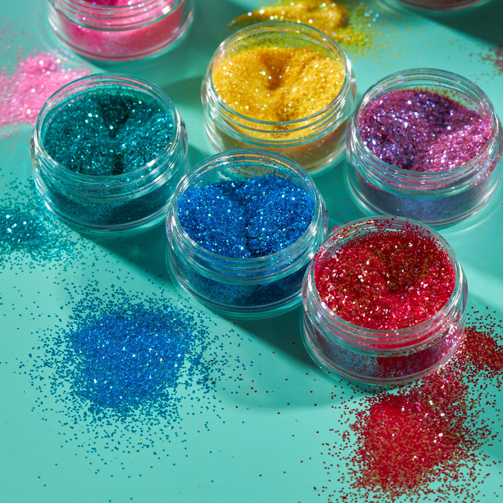 Iridescent Fine Face & Body Glitter Shaker. Cosmetically certified, FDA & Health Canada compliant, cruelty free and vegan.