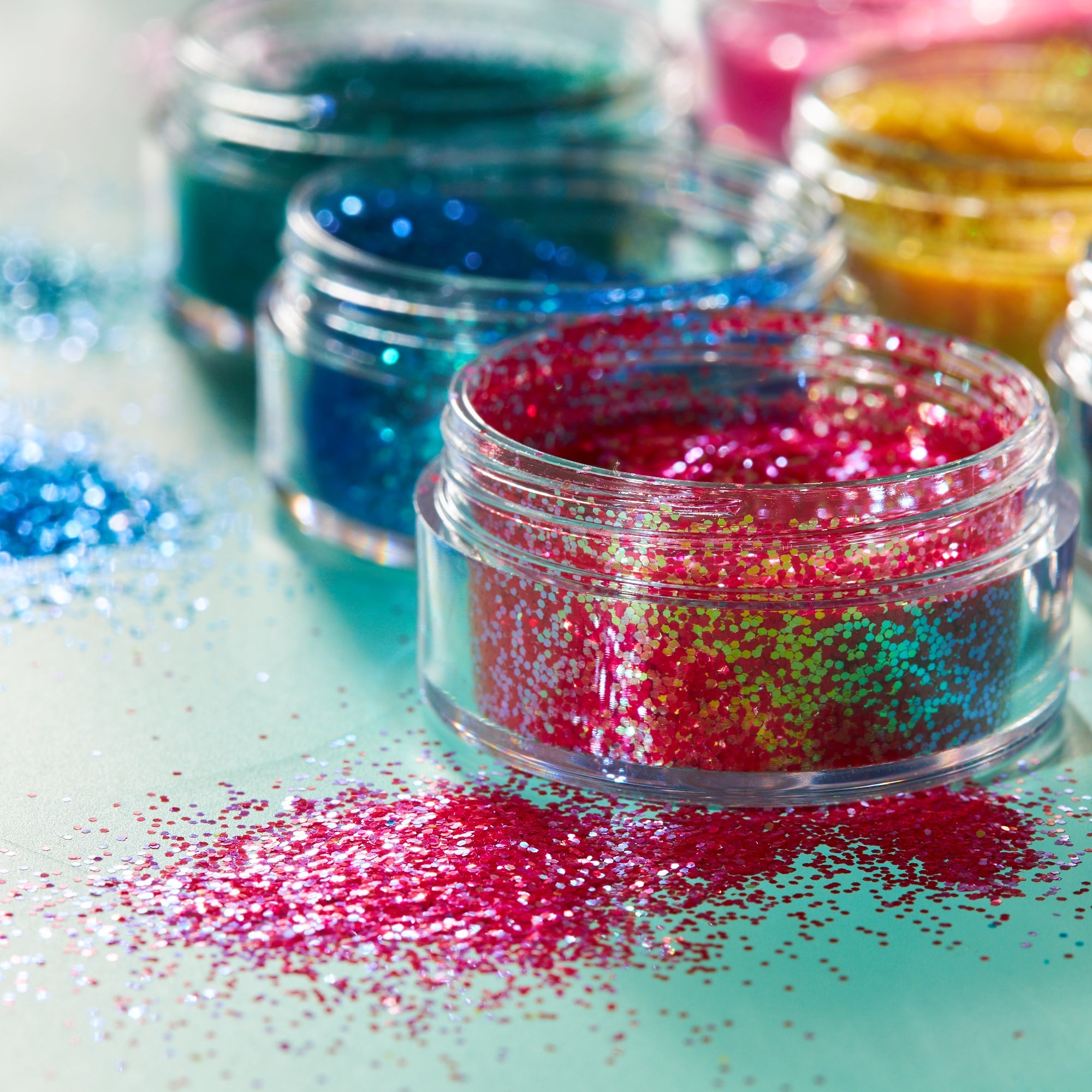 Iridescent Fine Face & Body Glitter Shaker. Cosmetically certified, FDA & Health Canada compliant, cruelty free and vegan.