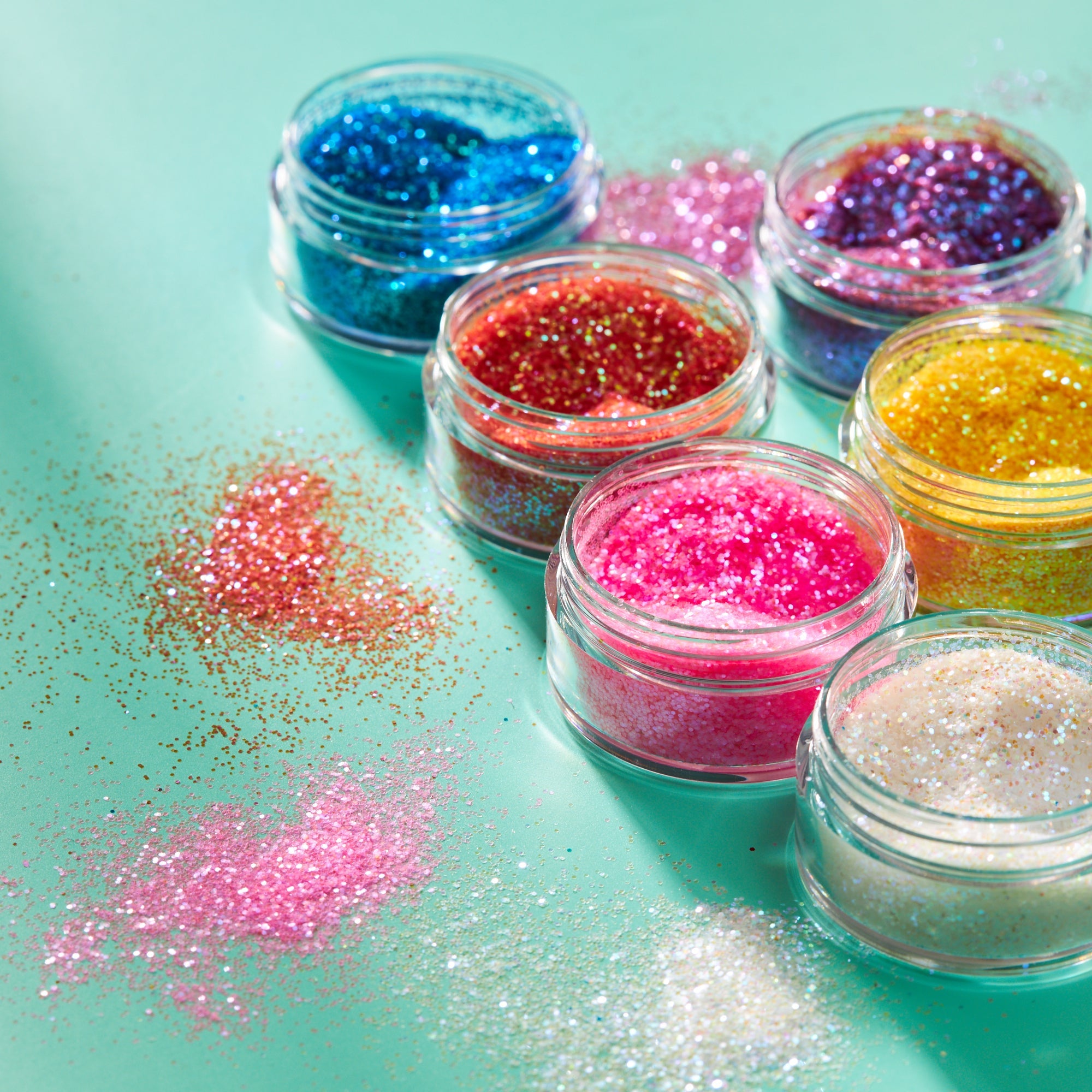 Iridescent Fine Face & Body Glitter Shaker. Cosmetically certified, FDA & Health Canada compliant, cruelty free and vegan.