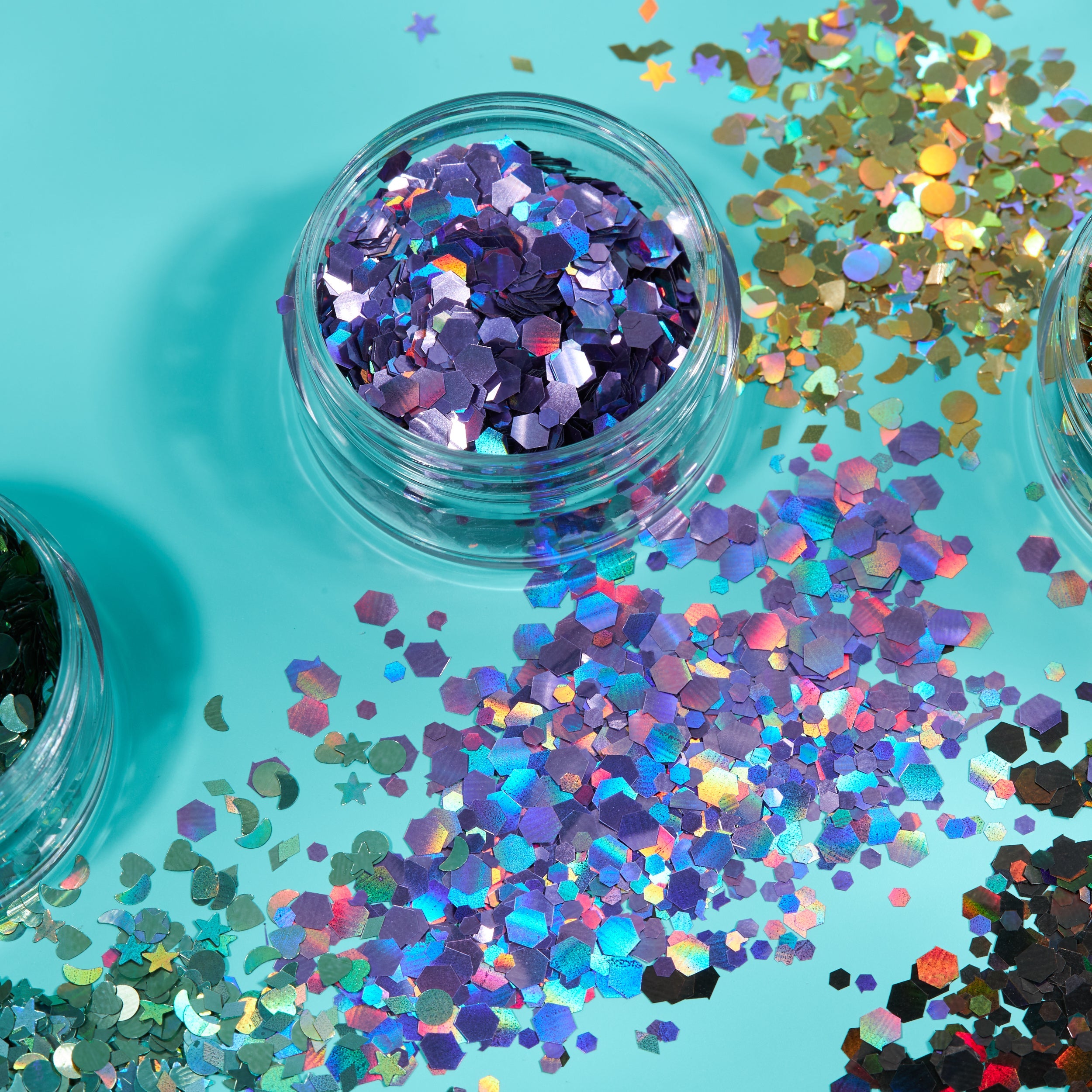 Holographic Face & Body Glitter Shapes. Cosmetically certified, FDA & Health Canada compliant, cruelty free and vegan.