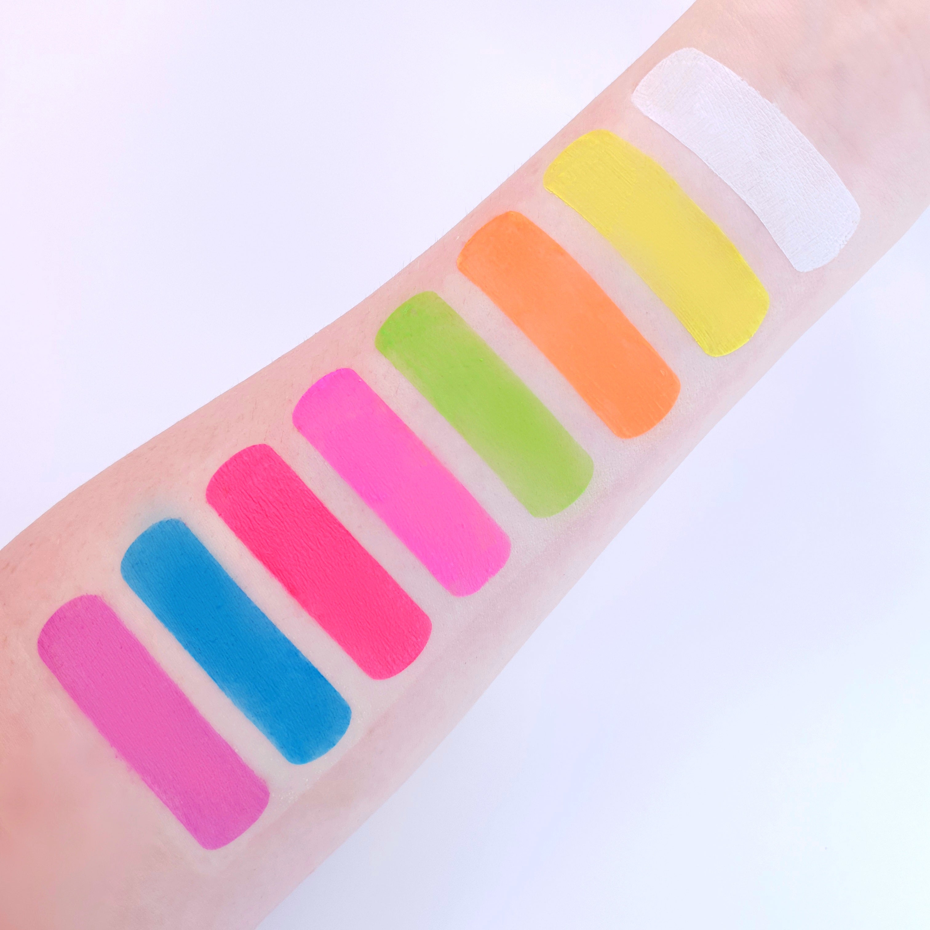 Neon UV Glow Blacklight Professional Face Paint. Cosmetically certified, FDA & Health Canada compliant, cruelty free and vegan.